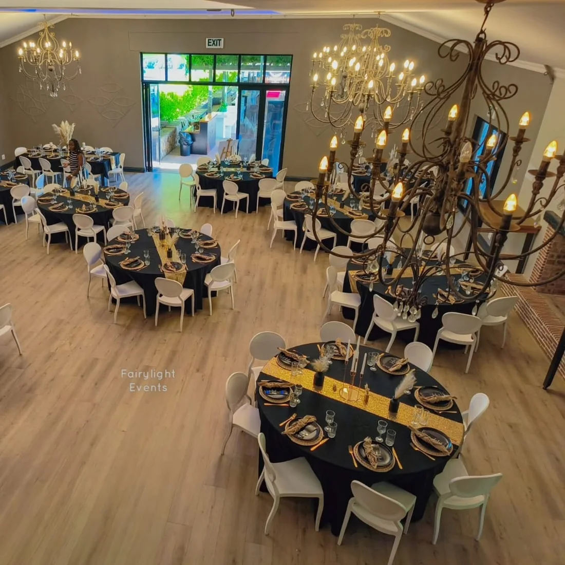 Black and gold corporate gala table styling by Fairylight Events